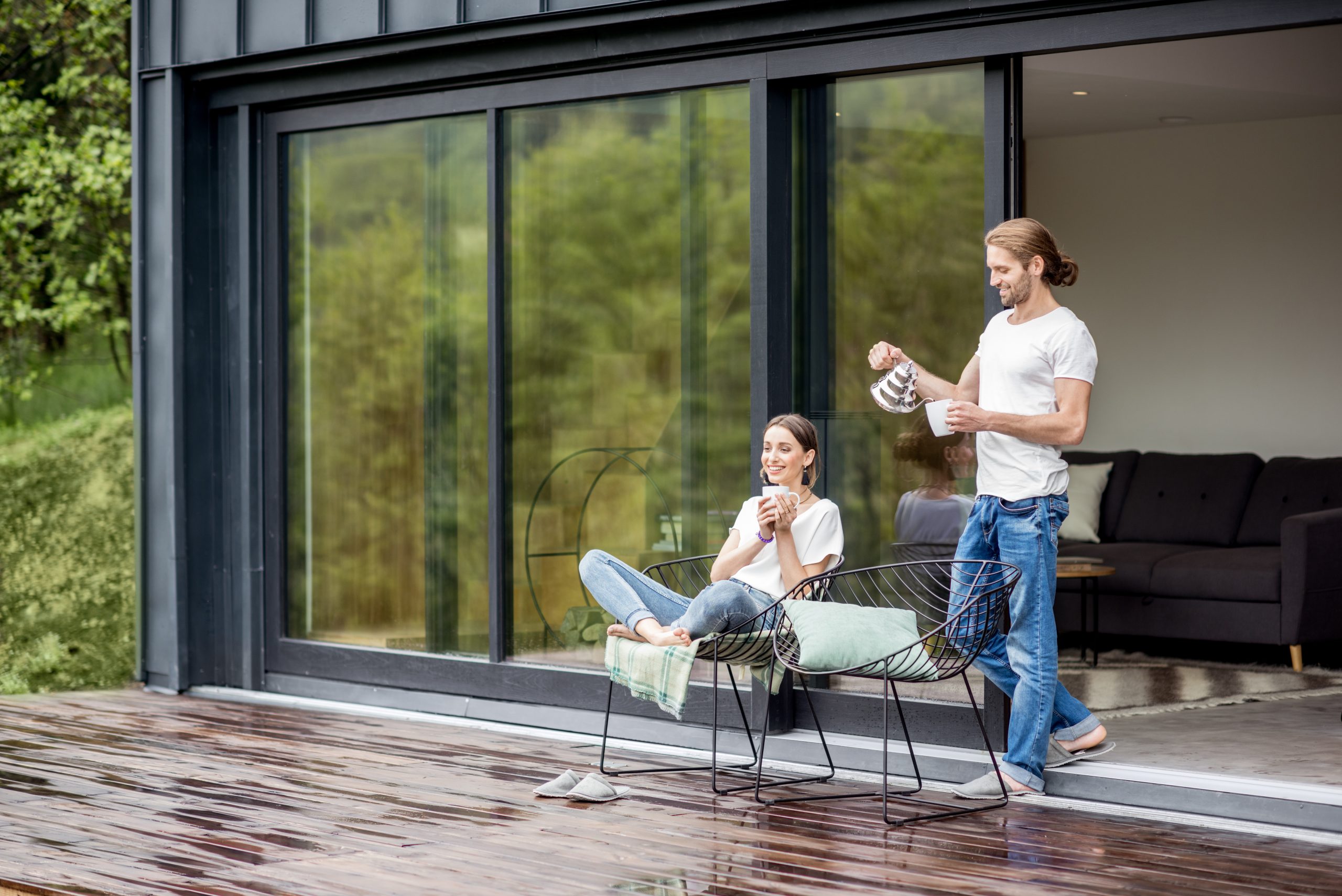 Couple on the terrace of the modern house